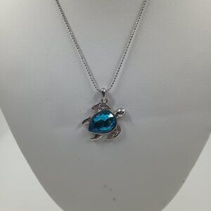 Silver Turtle Pendant Necklace with Aqua Crystal and Rhinestones.